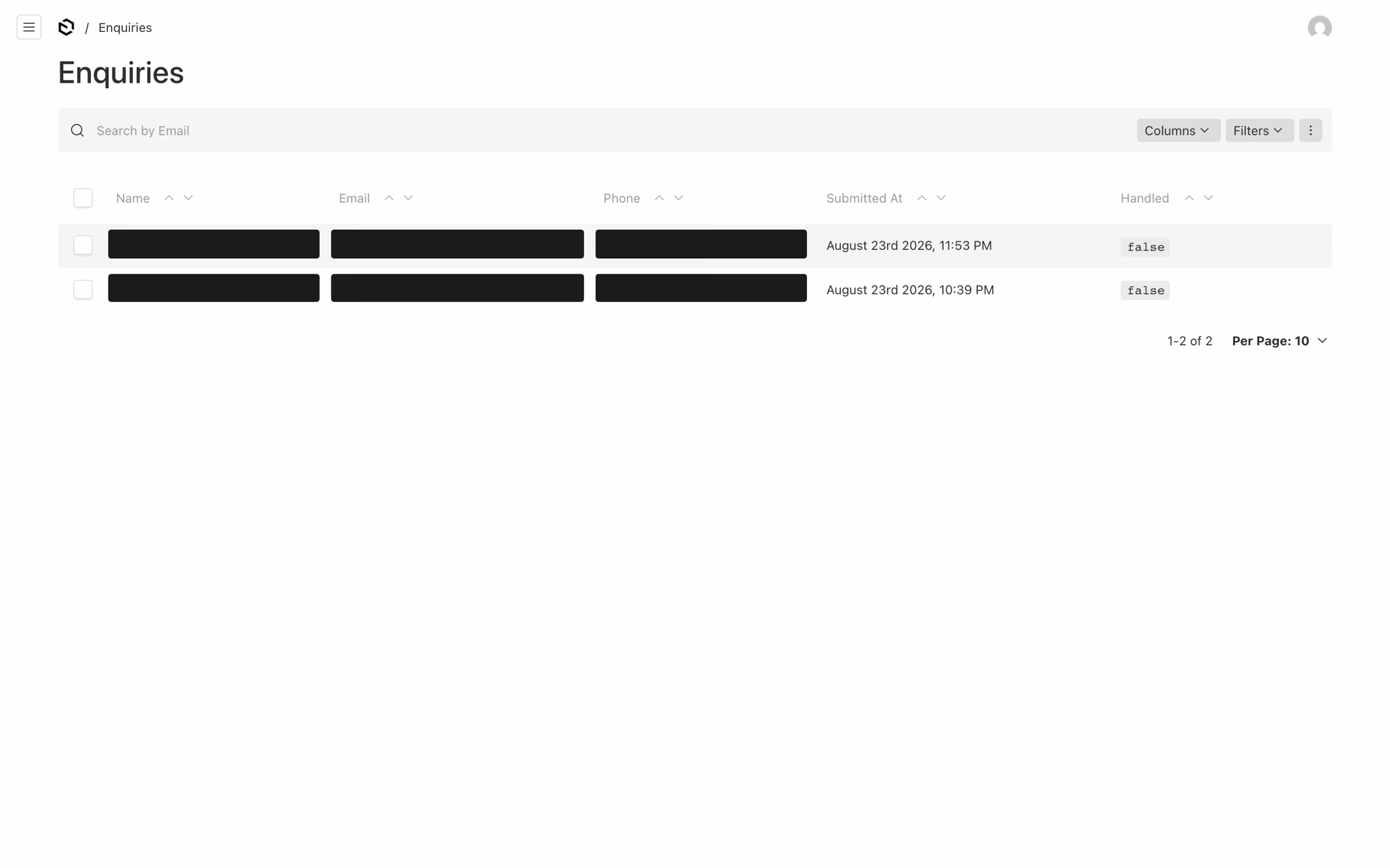 The enquiries list in Payload, two submissions, with the name, email and phone of both blacked out, and the submitted date and a handled flag beside them.